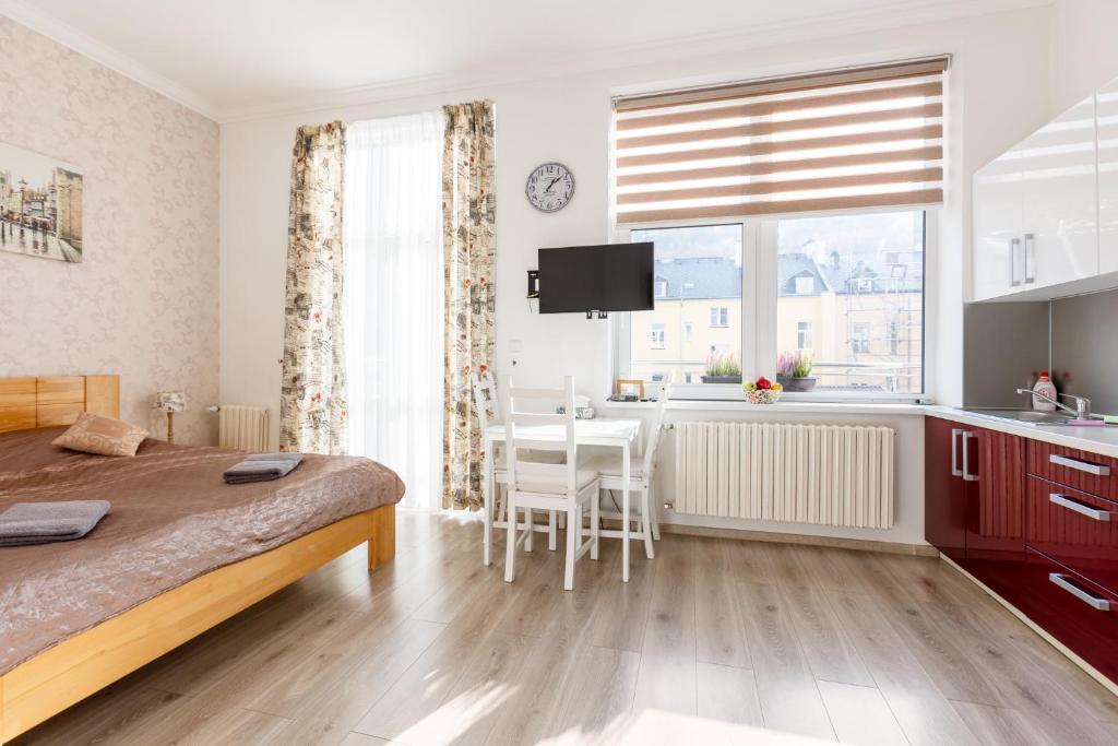 TV a/nebo společenská místnost v ubytování Apartment on Krymska