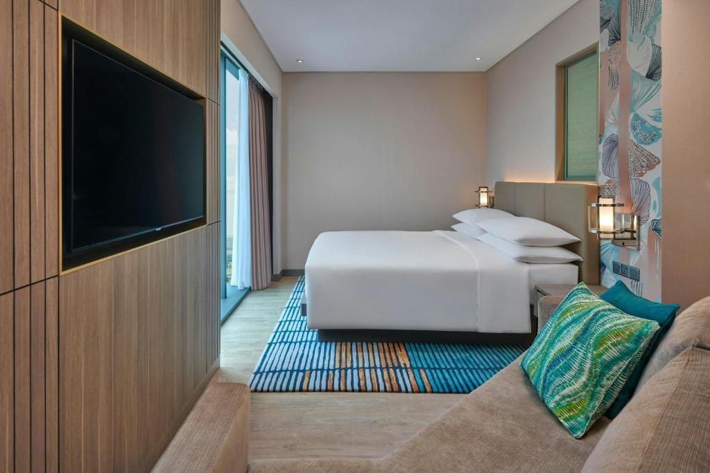 Postel nebo postele na pokoji v ubytování Courtyard by Marriott Setia Alam