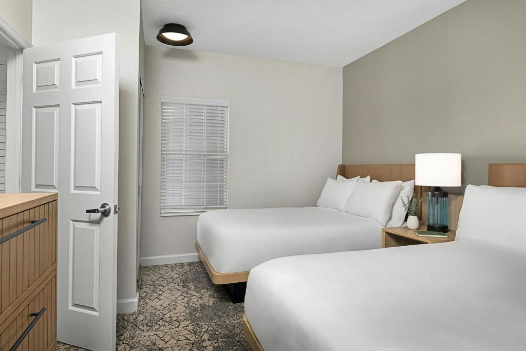 Sheraton Broadway Resort Villasにあるベッド