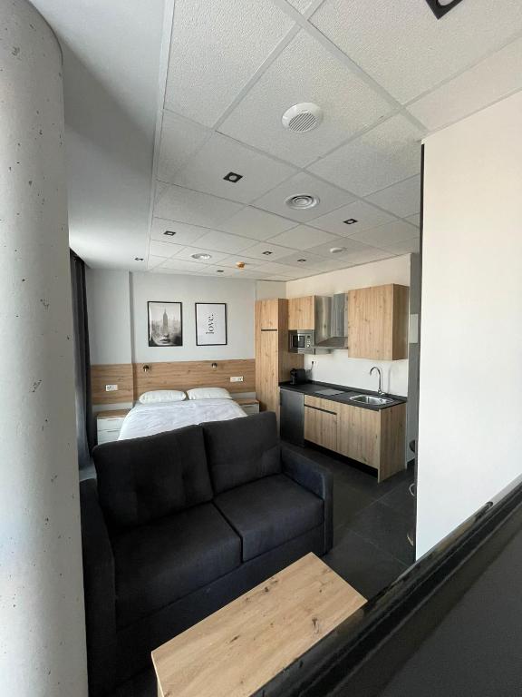 Kuchyň nebo kuchyňský kout v ubytování Apartamentos - Mirasur
