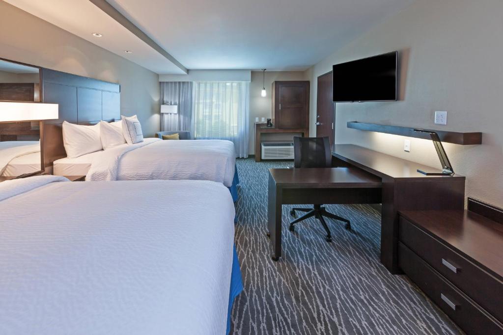 Postel nebo postele na pokoji v ubytování Courtyard by Marriott Abilene Northeast