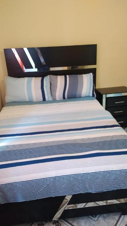 Postel nebo postele na pokoji v ubytování Guest House A&H