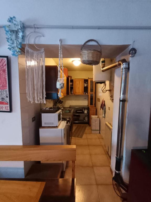 Kuchyň nebo kuchyňský kout v ubytování Casa Ta-Pù a Passolanciano