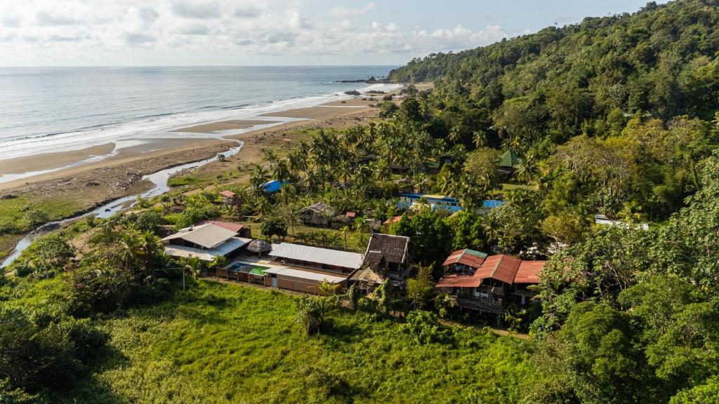 an aerial view of a resort next to the beach at Utria hostel in El Valle