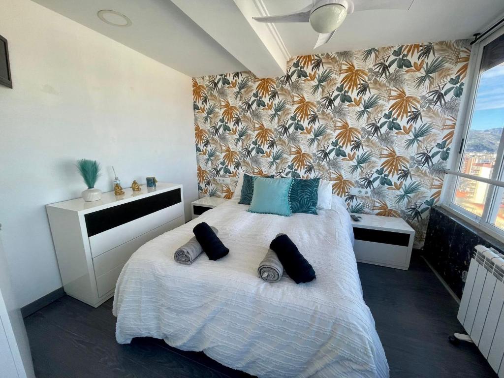 Postel nebo postele na pokoji v ubytování Apartamento Bonaire-primera linea playa