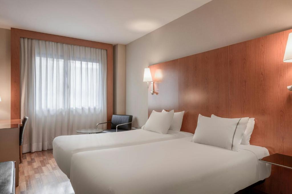 Postel nebo postele na pokoji v ubytování AC Hotel León San Antonio by Marriott