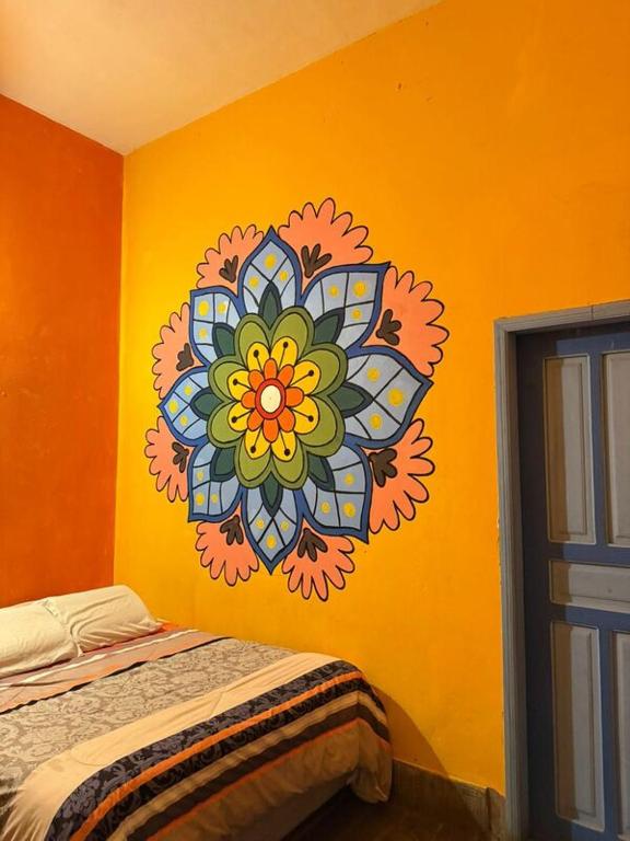 Postel nebo postele na pokoji v ubytování Hostal Café Tiana