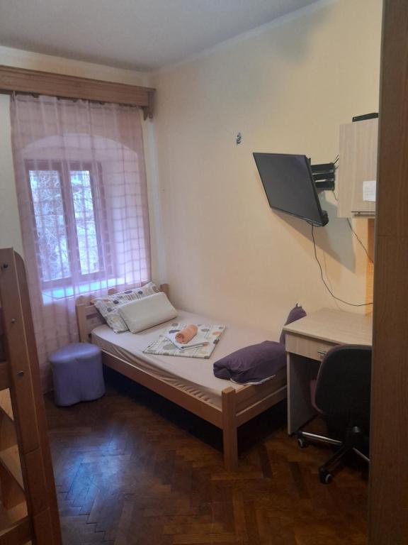 Posteľ alebo postele v izbe v ubytovaní Centar Starog Grada