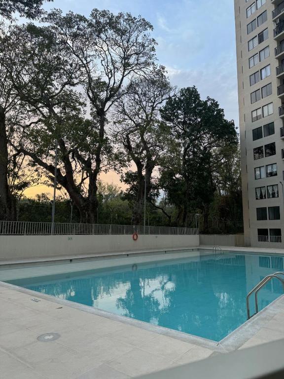 Bazén v ubytování Acogedor apartamento con vista nebo v jeho okolí