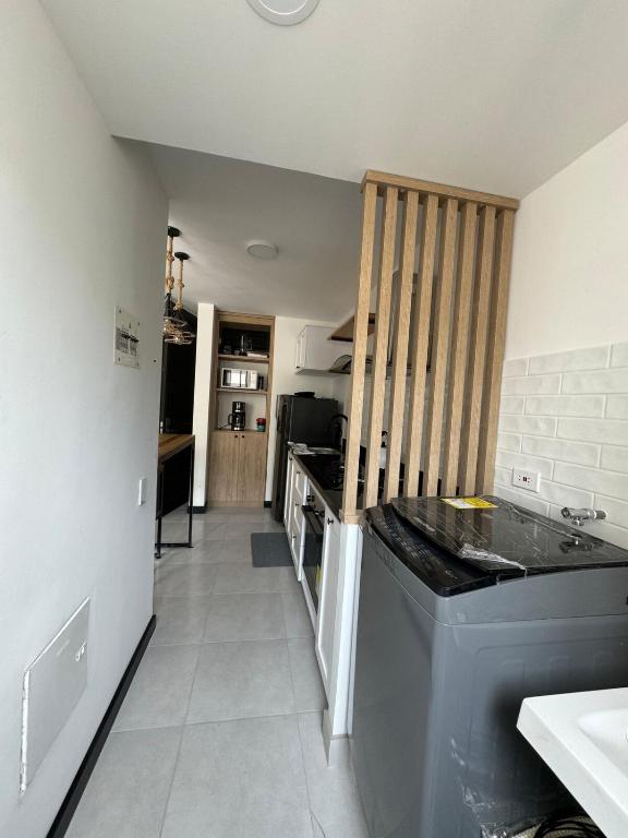 Kuchyň nebo kuchyňský kout v ubytování Acogedor apartamento con vista