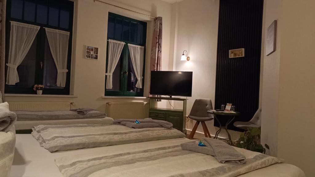 Postel nebo postele na pokoji v ubytování Hotel Villa Alice