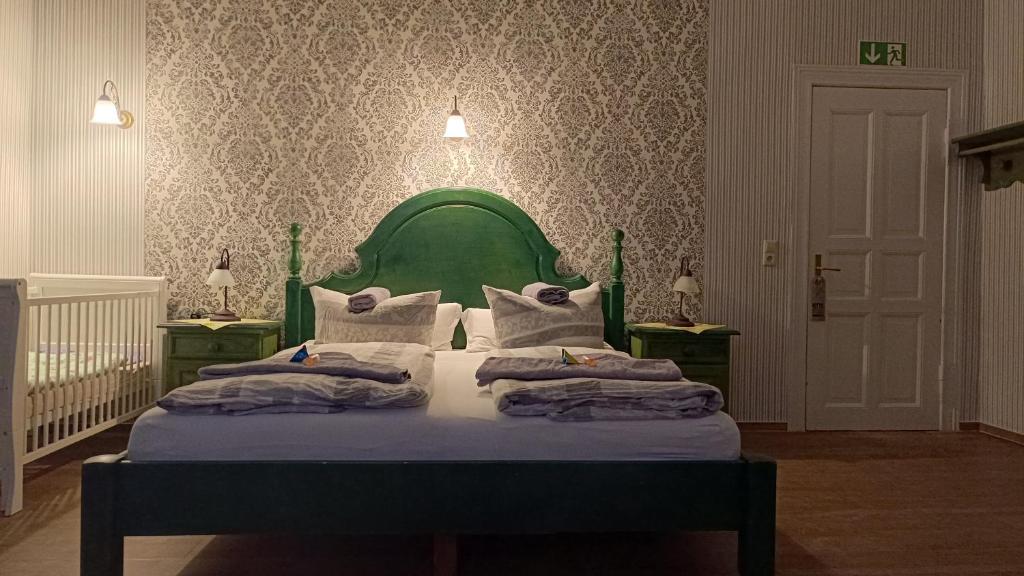 Postel nebo postele na pokoji v ubytování Hotel Villa Alice