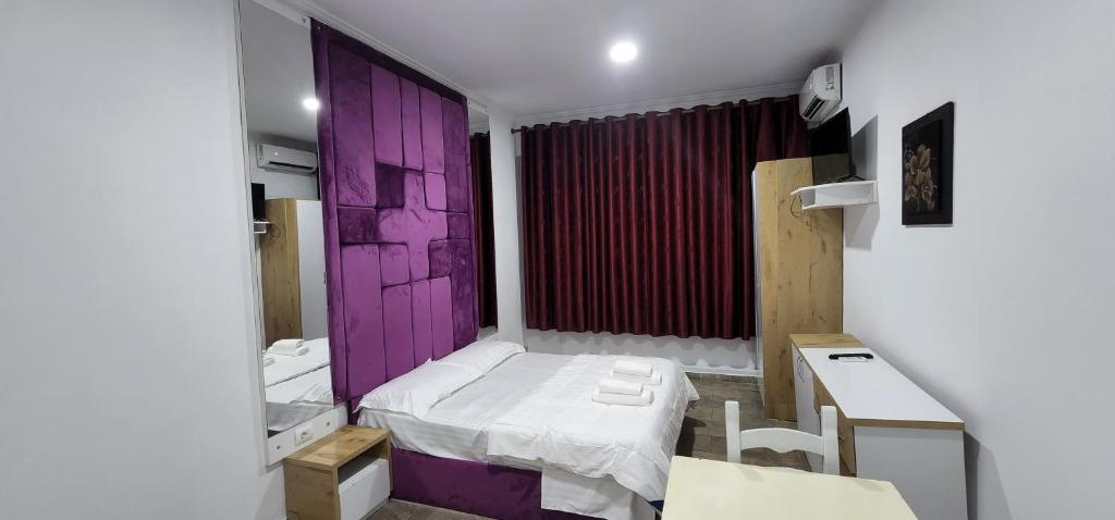 Postel nebo postele na pokoji v ubytování Hotel Kleo