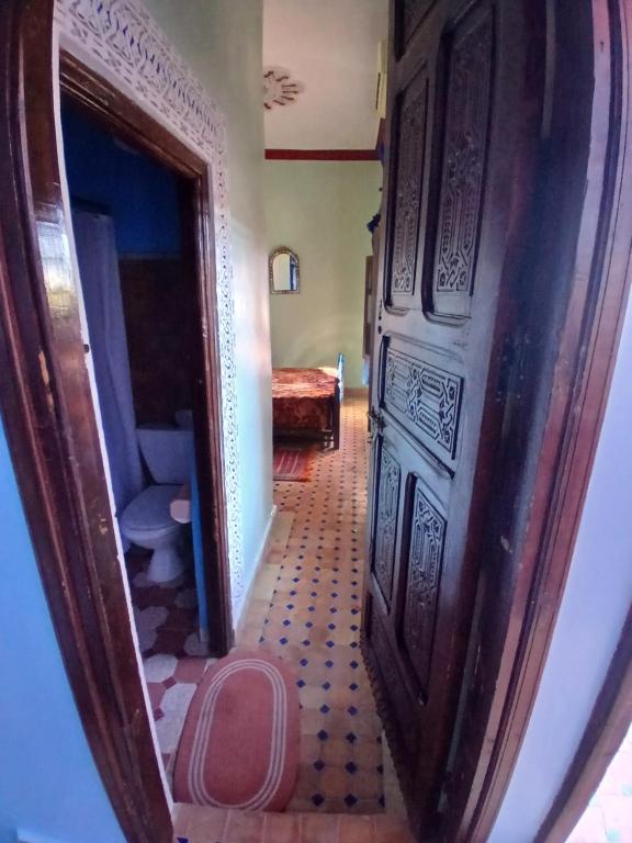 Postel nebo postele na pokoji v ubytování Riad Idrissi