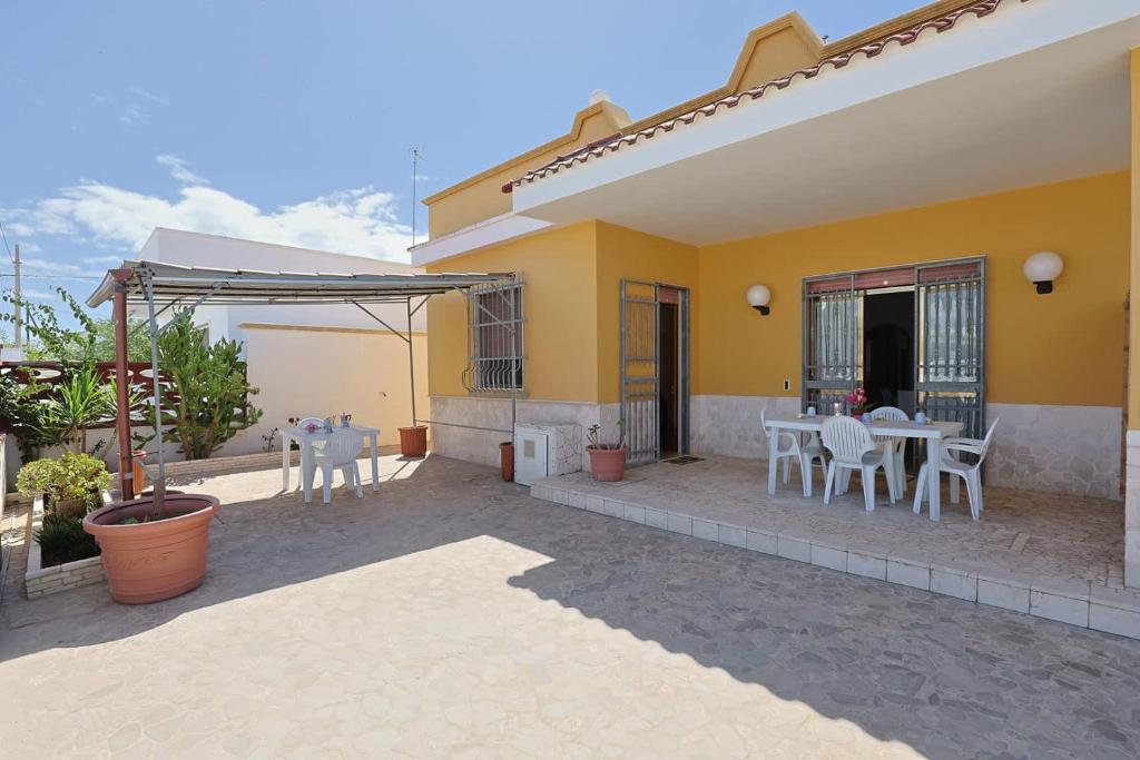 Gambar di galeri bagi Casa Monsellato 1B SX a soli 120 mt dalla spiaggia Padula Fede di Punta Prosciutto di Punta Prosciutto