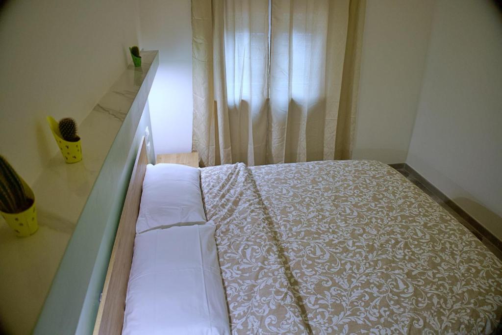 Postel nebo postele na pokoji v ubytování B&B IlTempio