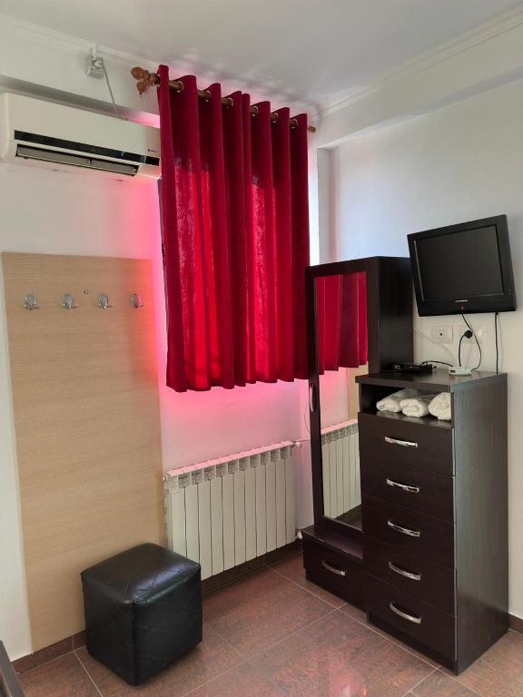 TV a/nebo společenská místnost v ubytování Hotel Kleo