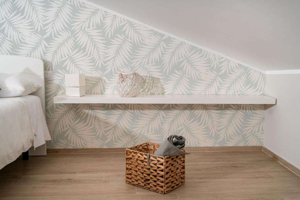 Łóżko lub łóżka w pokoju w obiekcie Otium Rooms / Camere e Appartamenti