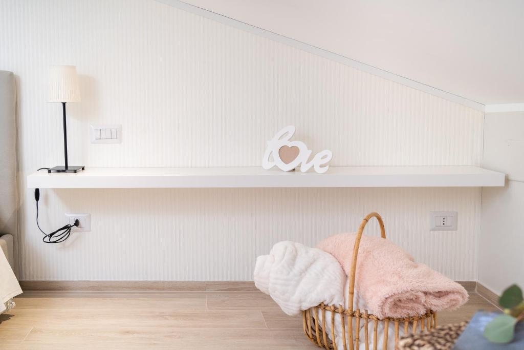 Łóżko lub łóżka w pokoju w obiekcie Otium Rooms / Camere e Appartamenti