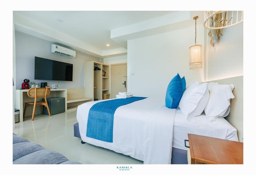 Postel nebo postele na pokoji v ubytování Kamala Havana Hotel