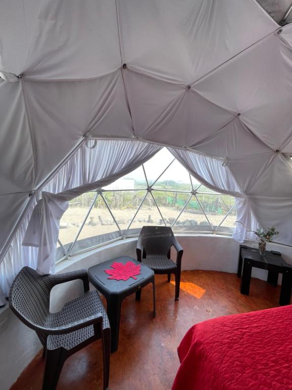Posezení v ubytování Glamping Burbuja