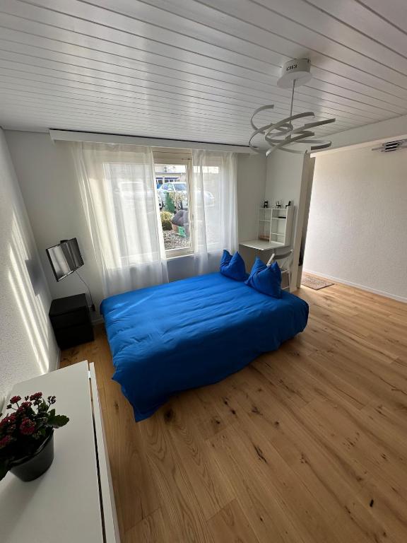 Postel nebo postele na pokoji v ubytování Gästehaus MaryVitty, zentrale zwischen Aarau und Olten, gut verbunden