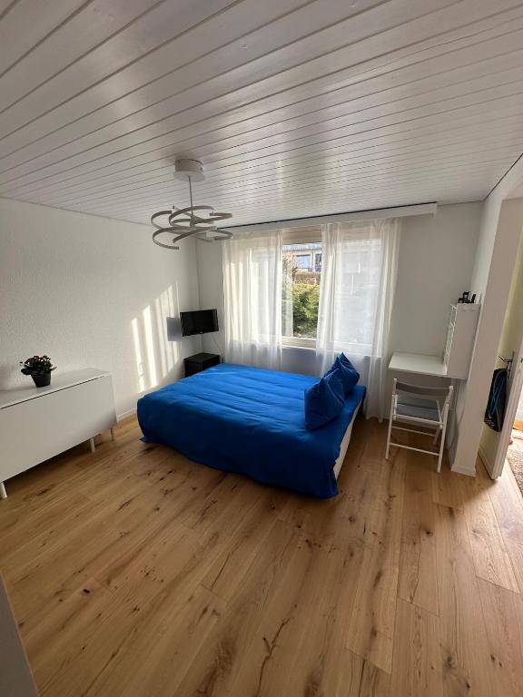 Postel nebo postele na pokoji v ubytování Gästehaus MaryVitty, zentrale zwischen Aarau und Olten, gut verbunden