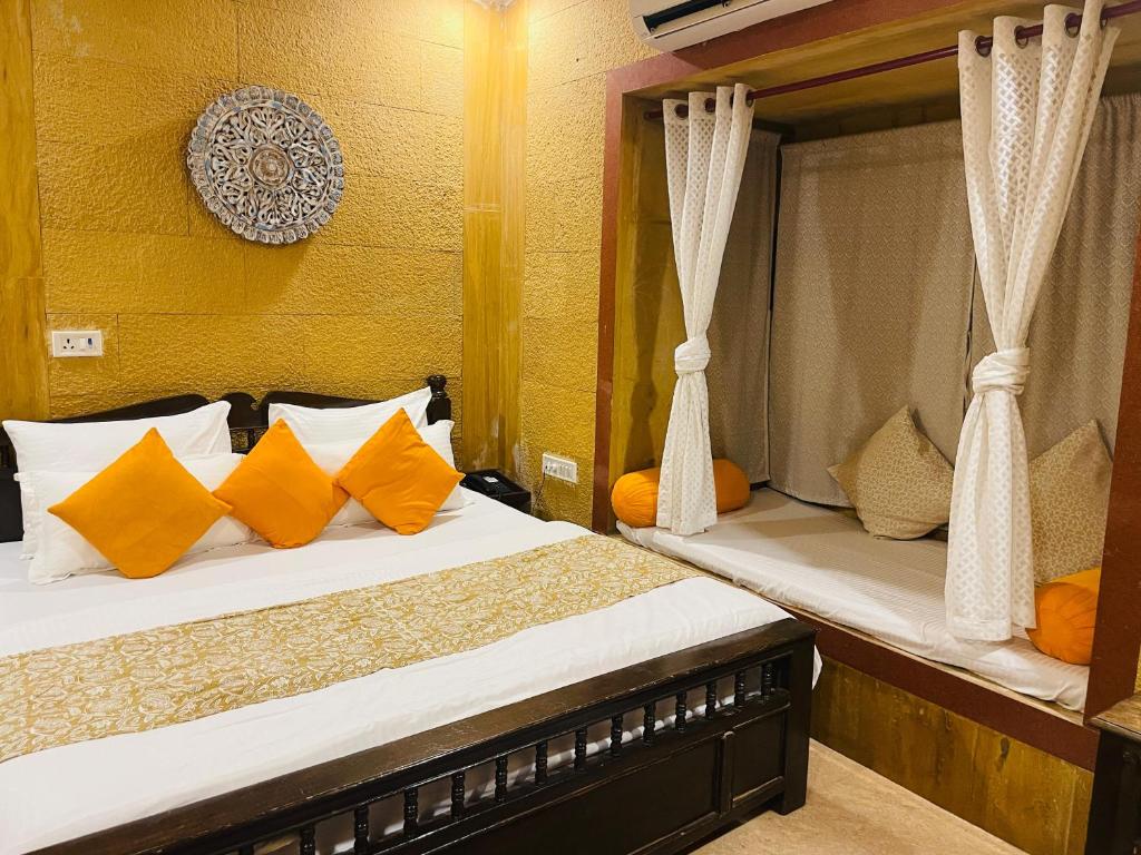 Postel nebo postele na pokoji v ubytování Hotel Meerana