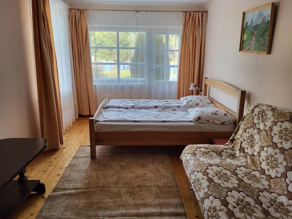 Lova arba lovos apgyvendinimo įstaigoje Sodyba - Antalieptės marios