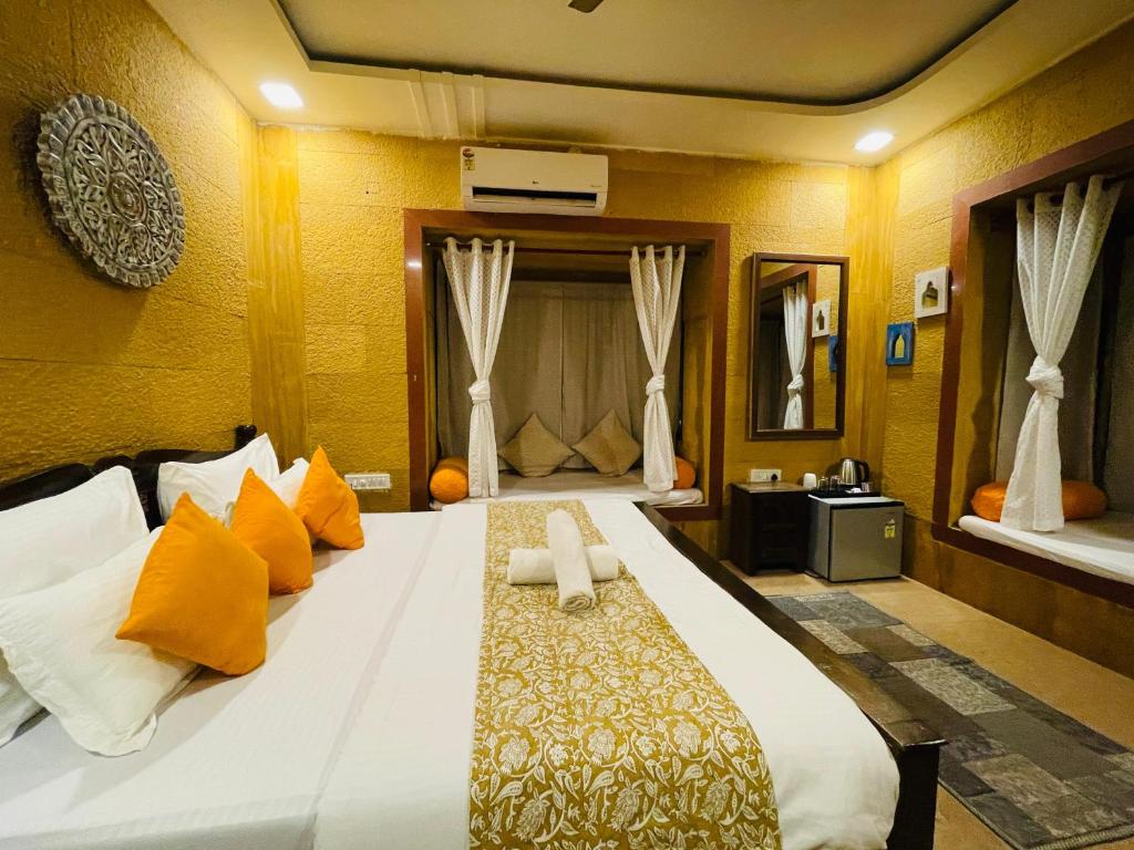 Postel nebo postele na pokoji v ubytování Hotel Meerana