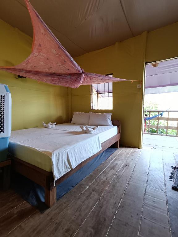 Postel nebo postele na pokoji v ubytování Sea Views bungalow kohrong