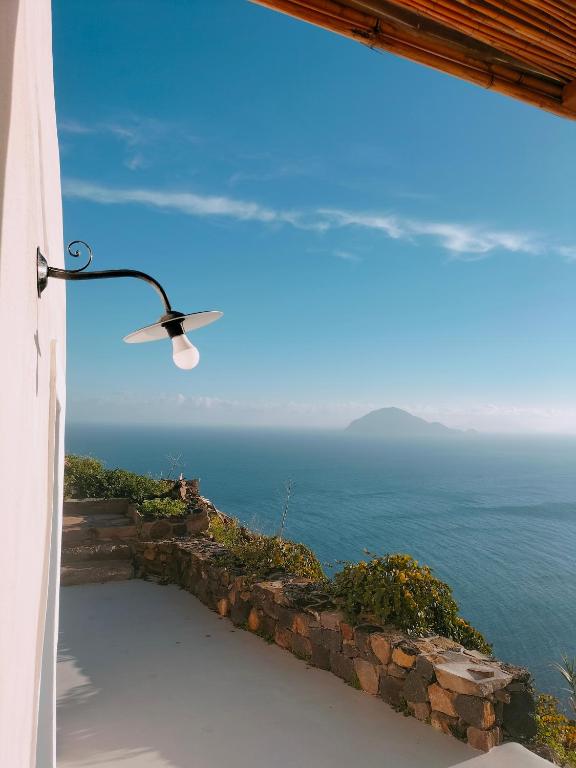 a window view of the ocean from a house at L'Olivuzza in Alicudi
