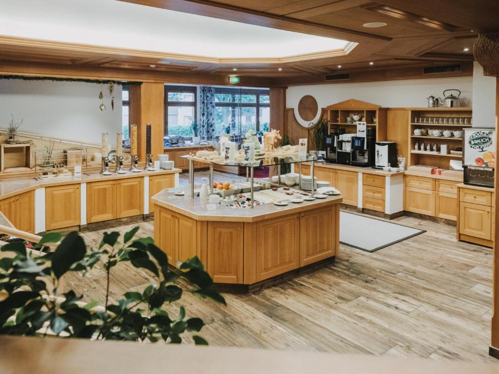 Kuchyň nebo kuchyňský kout v ubytování Hotel Zimba