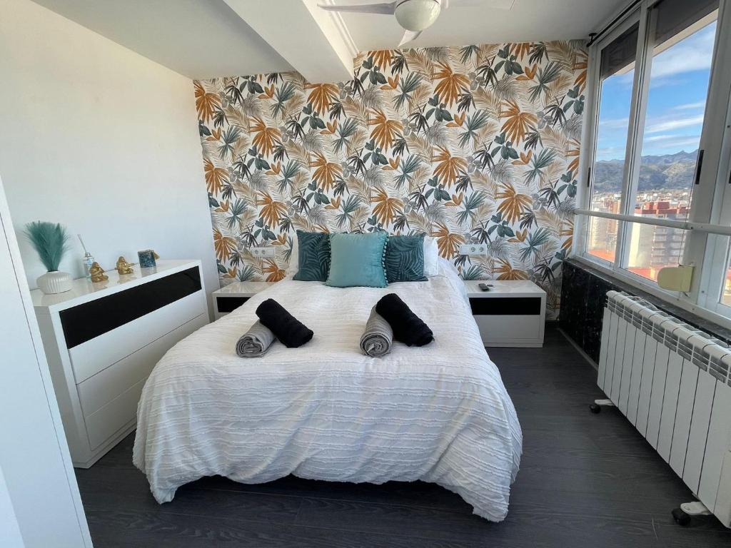 Postel nebo postele na pokoji v ubytování Apartamento Bonaire-primera linea playa