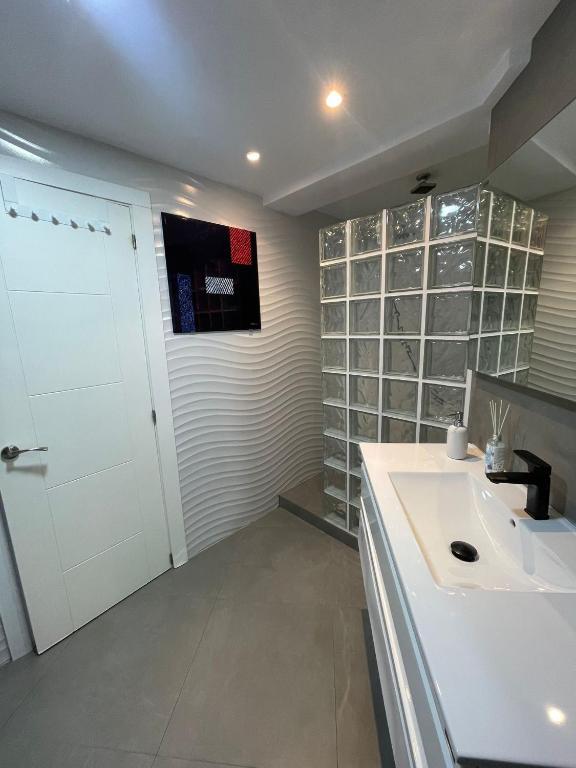 Kuchyň nebo kuchyňský kout v ubytování Apartamento Bonaire-primera linea playa