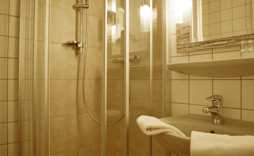 Koupelna v ubytování Hotel Am Obermarkt