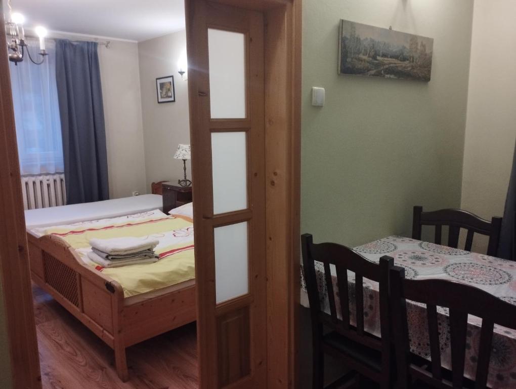 Posteľ alebo postele v izbe v ubytovaní Pod limbą