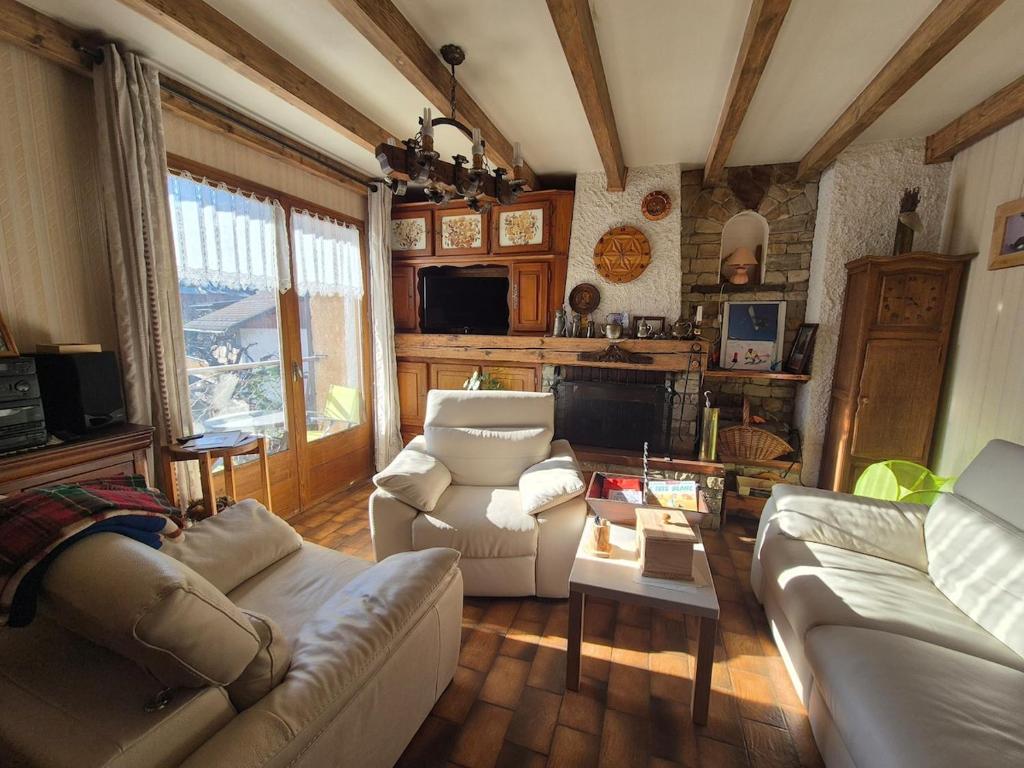 Et tv og/eller underholdning på Appartement 4pers avec jardin - Centre BSM