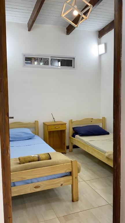 Postel nebo postele na pokoji v ubytování Posada El Ceibo