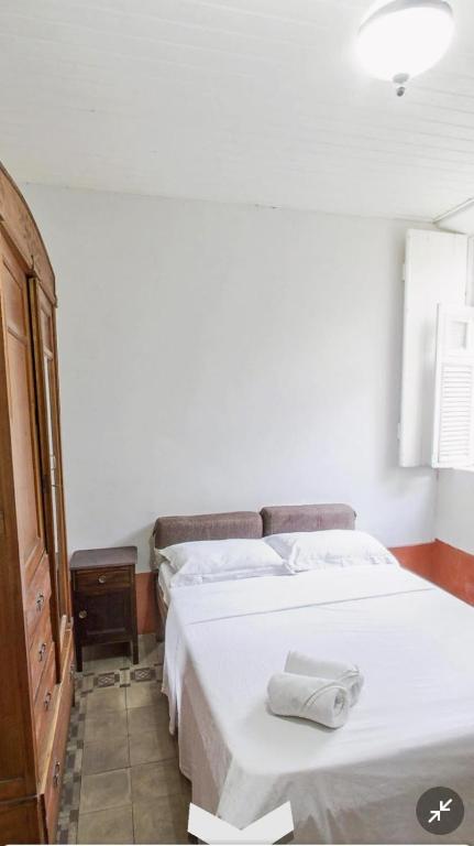 Postel nebo postele na pokoji v ubytování Cenário Hostel e Boteco