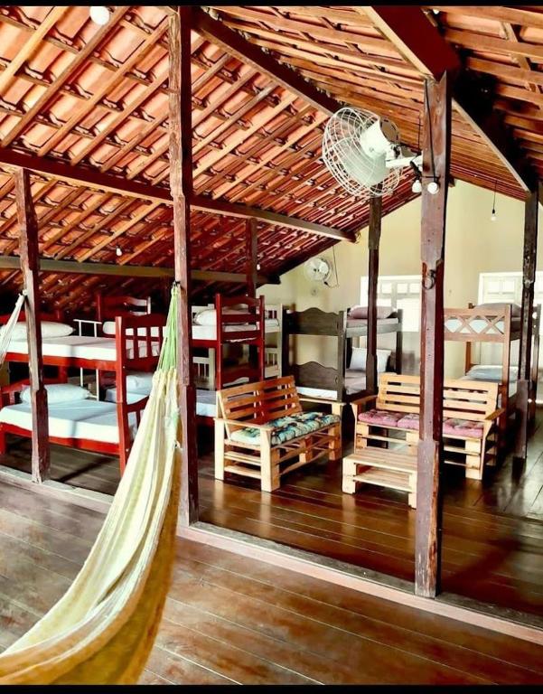 Postel nebo postele na pokoji v ubytování Cenário Hostel e Boteco