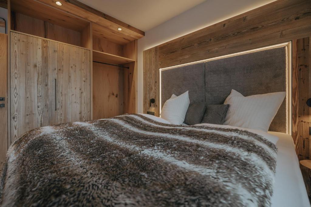 Postel nebo postele na pokoji v ubytování BRUGGER ApartHotel