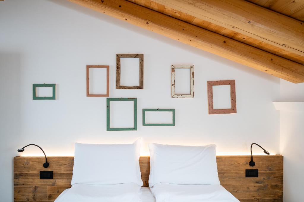 Postel nebo postele na pokoji v ubytování Borgo Paolin - Camere in vigna