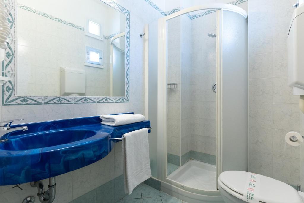 Koupelna v ubytování Hotel Concord