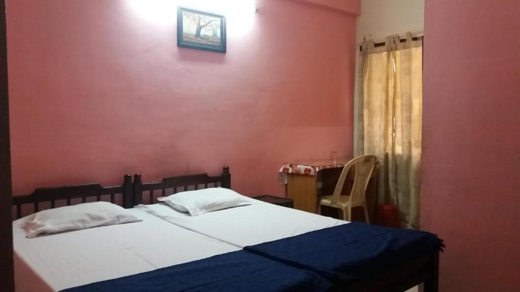 Postel nebo postele na pokoji v ubytování Classic Tourist Home