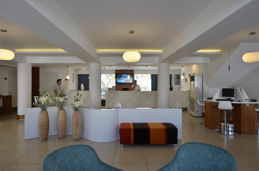 TV a/nebo společenská místnost v ubytování Calimera Side Resort