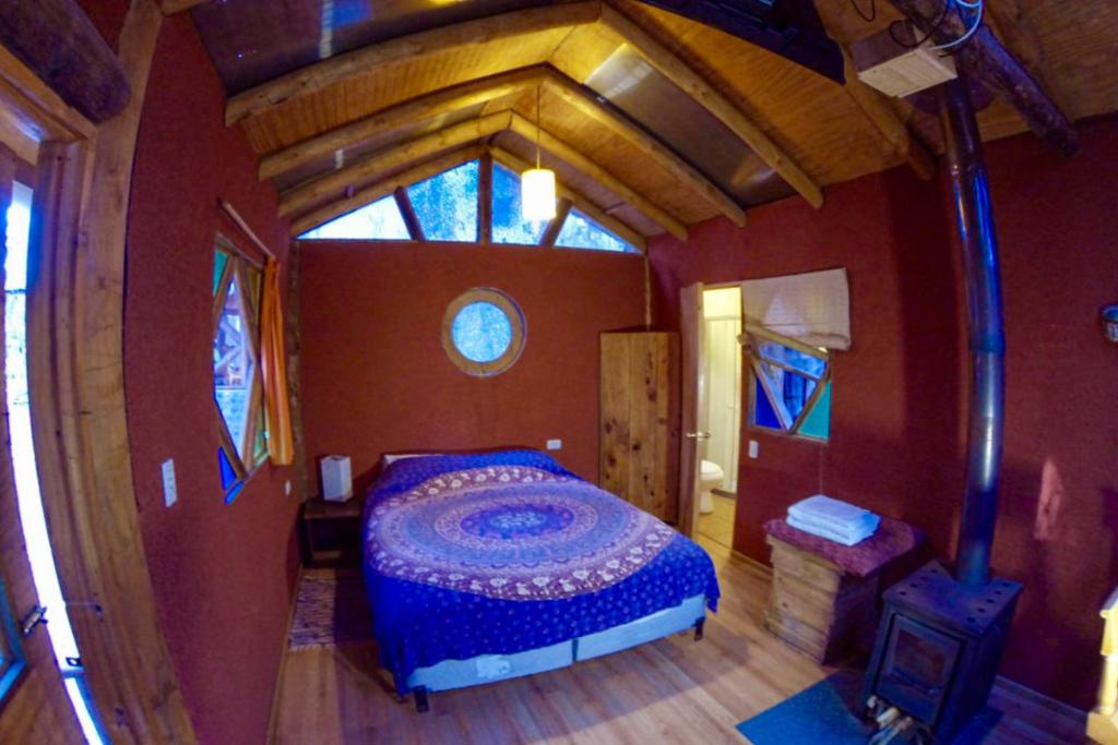 Postel nebo postele na pokoji v ubytování Cabanas Curi-Huapi