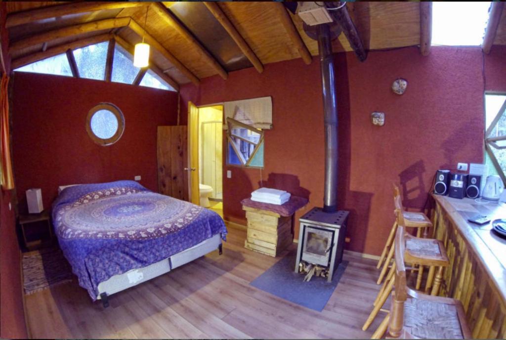 Postel nebo postele na pokoji v ubytování Cabanas Curi-Huapi