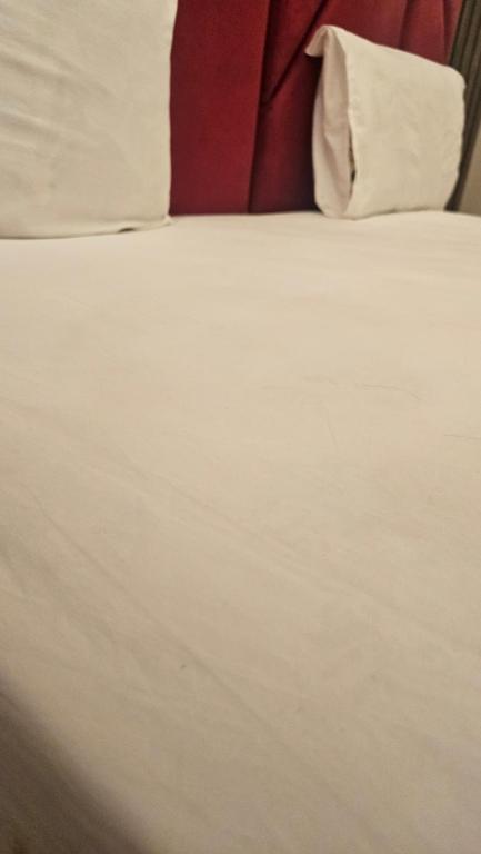Ένα ή περισσότερα κρεβάτια σε δωμάτιο στο Dream Inn Guest House