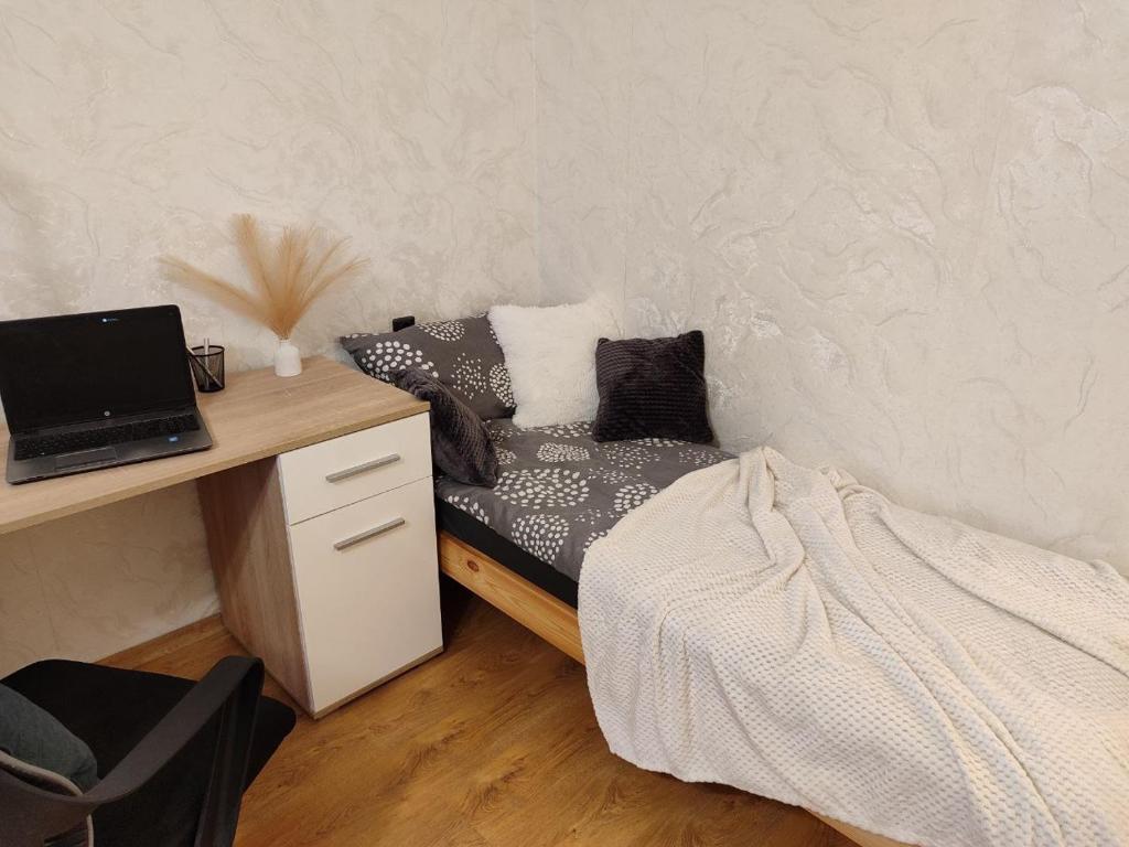 Postel nebo postele na pokoji v ubytování Narva Vahtra Apartment